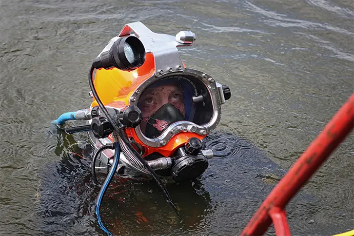 Military diver looking for mines